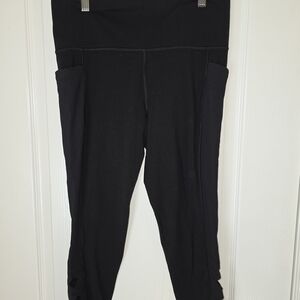Athleta Salutation Stash Pocket II Cutout 7/8  Black Women's Tights